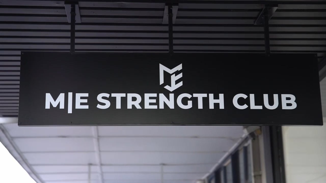 The M|E Strength Club sign on East Concourse
